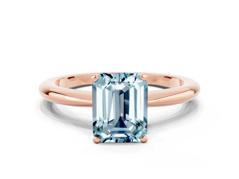 Rose gold Emerald Cut Aquamarine Solitaire Ring with Six-Prong Setting and Classic Band