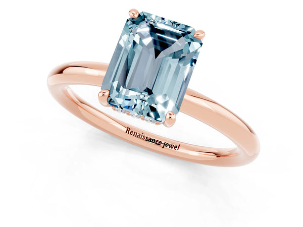 Rose gold Emerald Cut Aquamarine Solitaire Ring with Thin Band and Four-Prong Setting