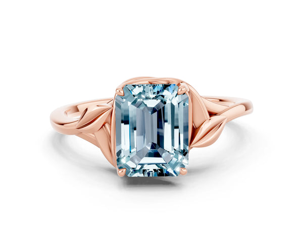 Rose gold Emerald Cut Aquamarine Solitaire Ring with Twist Band and Four-Prong Setting