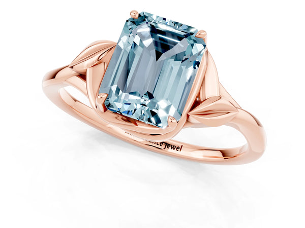 Rose gold Emerald Cut Aquamarine Solitaire Ring with Twist Band and Four-Prong Setting