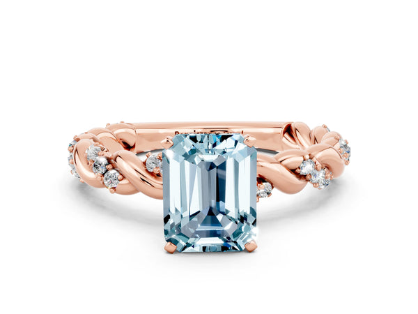 Rose gold Emerald Cut Aquamarine Solitaire Ring with Twisted Band and Pavé Accents