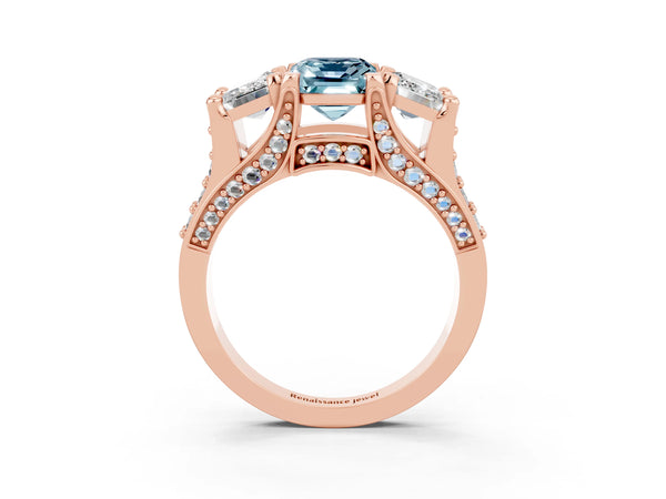 Rose gold Emerald Cut Aquamarine Three-Stone Ring with Channel Set Band and Four-Prong Setting