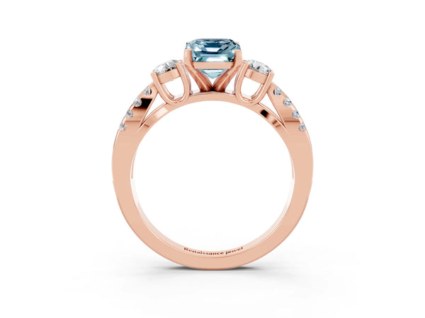 Rose gold Emerald Cut Aquamarine Three-Stone Ring with Pavé Split Shank and Four-Prong Setting