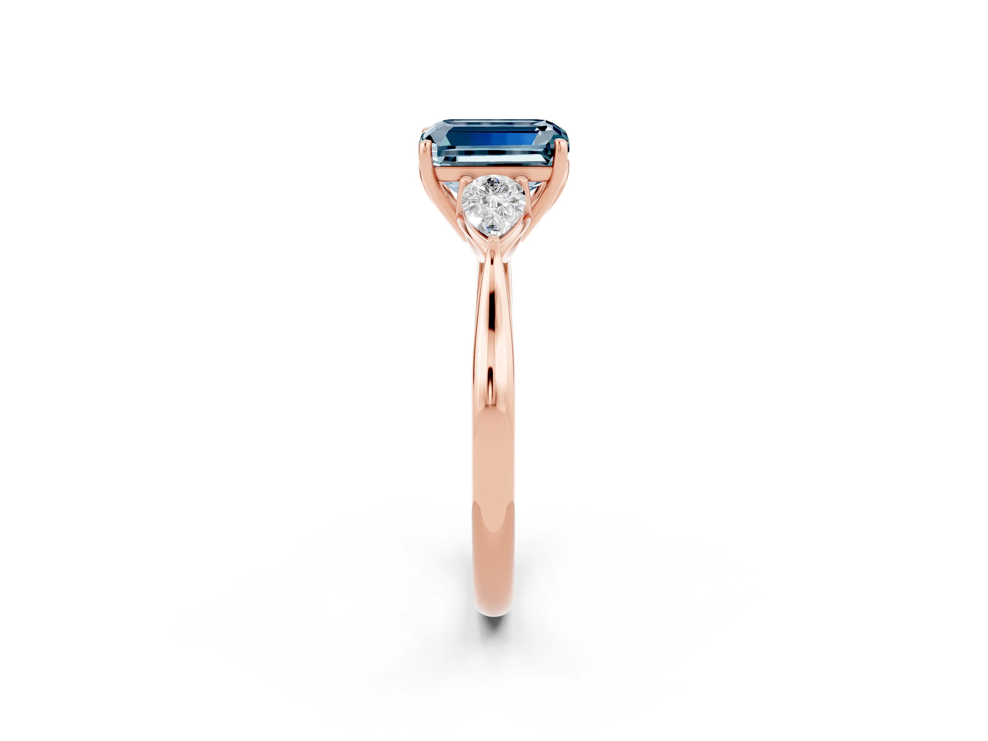 Rose gold Emerald Cut Aquamarine Three-Stone Ring with Pear Side Stones and Four-Prong Setting_14
