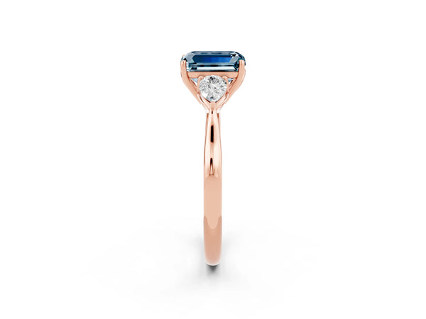 Rose gold Emerald Cut Aquamarine Three-Stone Ring with Pear  Side Stones and Prong Setting