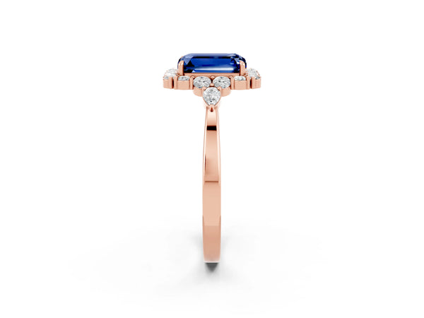 Rose gold Emerald Cut Blue Sapphire Halo Ring with Pear Side Stones and Prong Setting
