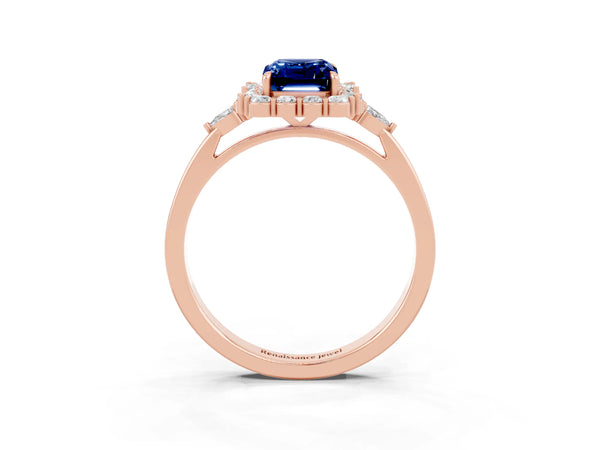 Rose gold Emerald Cut Blue Sapphire Halo Ring with Pear Side Stones and Prong Setting