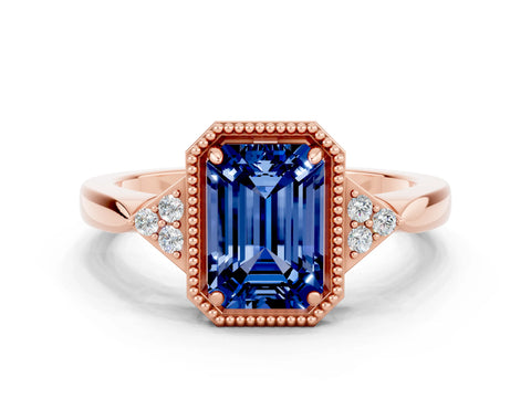 Rose gold Emerald Cut Blue Sapphire Halo Ring with Tapered Band and Four-Prong Setting