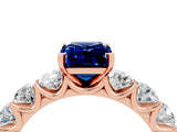 Rose gold Emerald Cut Blue Sapphire Prong Setting with Side Stones on a Pave Band_4