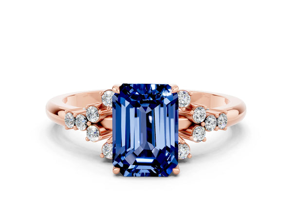 Rose gold Emerald Cut Blue Sapphire Ring with Side Stones and Four-Prong Setting