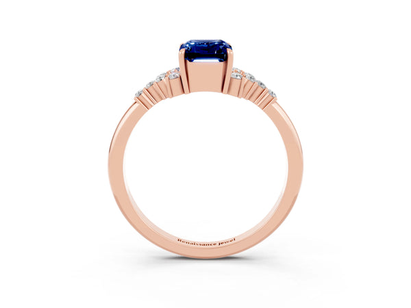 Rose gold Emerald Cut Blue Sapphire Ring with Side Stones and Four-Prong Setting