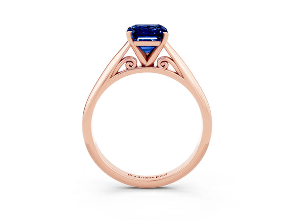 Rose gold Emerald Cut Blue Sapphire Solitaire Engagement Ring with Cathedral Setting and Four-Prong Mount