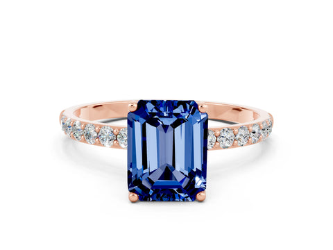 Rose gold Emerald Cut Blue Sapphire Solitaire Engagement Ring with Pavé Band and Prong Setting