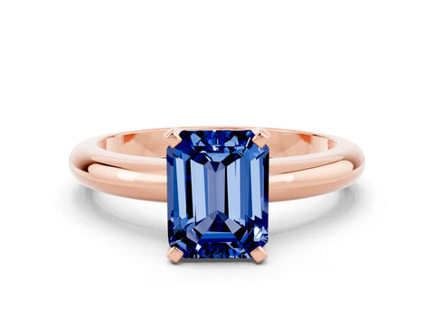 Rose gold Emerald Cut Blue Sapphire Solitaire Engagement Ring with Round Band and Four-Prong Setting