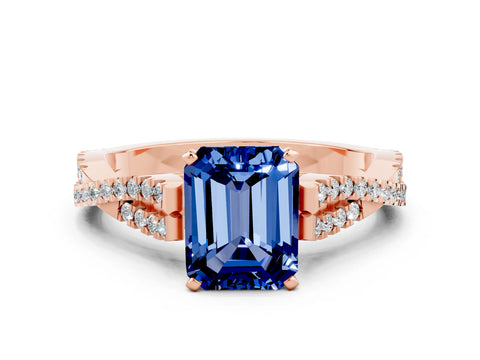 Rose gold Emerald Cut Blue Sapphire Solitaire Engagement Ring with Twisted Pavé Band and Four-Prong Setting