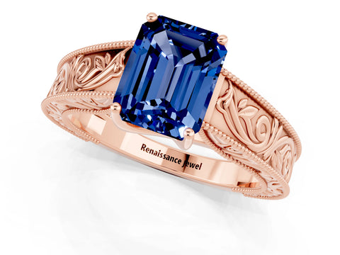 Rose gold Emerald Cut Blue Sapphire Solitaire Ring with Engraved Band and Four-Prong Setting_1
