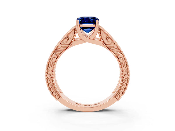 Rose gold Emerald Cut Blue Sapphire Solitaire Ring with Engraved Band and Four-Prong Setting