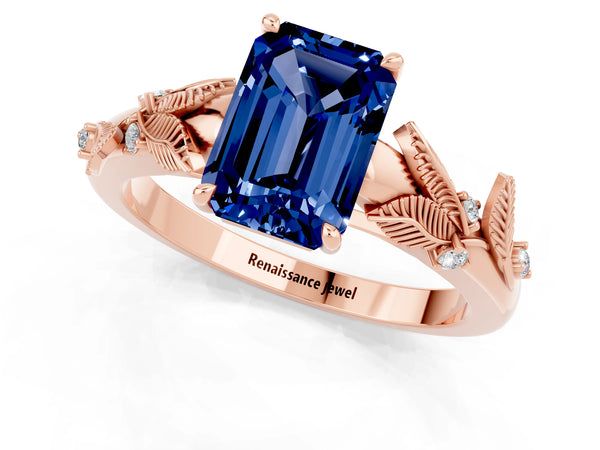 Rose gold Emerald Cut Blue Sapphire Solitaire Ring with Leaf Motif Band and Four-Prong Setting