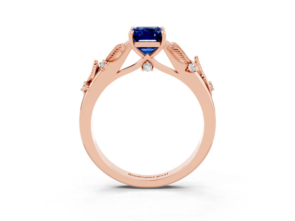 Rose gold Emerald Cut Blue Sapphire Solitaire Ring with Leaf Motif Band and Four-Prong Setting