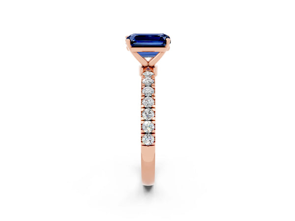 Rose gold Emerald Cut Blue Sapphire Solitaire Ring with Pavé Accents and Four-Prong Setting