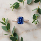 Rose gold Emerald Cut Blue Sapphire Solitaire Ring with Round  Pavé Band and Four-Prong Setting_45