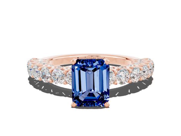 Rose gold Emerald Cut Blue Sapphire Solitaire Ring with Shared Prong Pavé Band and Four-Prong Setting