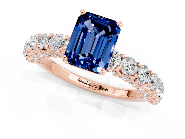 Rose gold Emerald Cut Blue Sapphire Solitaire Ring with Shared Prong Pavé Band and Four-Prong Setting