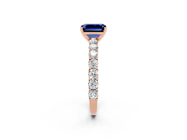 Rose gold Emerald Cut Blue Sapphire Solitaire Ring with Shared Prong Pavé Band and Four-Prong Setting