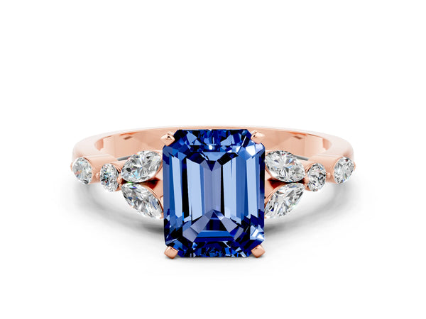 Rose gold Emerald Cut Blue Sapphire Solitaire Ring with Side Stones and Four-Prong Setting