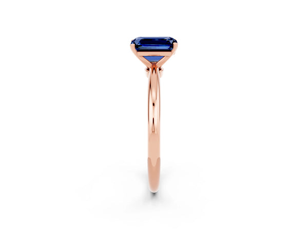 Rose gold Emerald Cut Blue Sapphire Solitaire Ring with Six-Prong Setting and Classic Band
