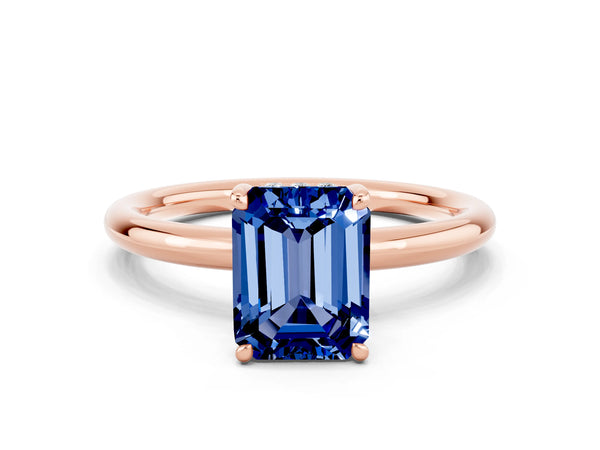 Rose gold Emerald Cut Blue Sapphire Solitaire Ring with Thin Band and Four-Prong Setting