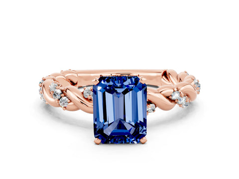 Rose gold Emerald Cut Blue Sapphire Solitaire Ring with Twisted Band and Pavé Accents