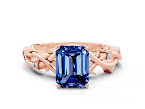 Rose gold Emerald Cut Blue Sapphire Solitaire Ring with Twisted Band and Prong Setting