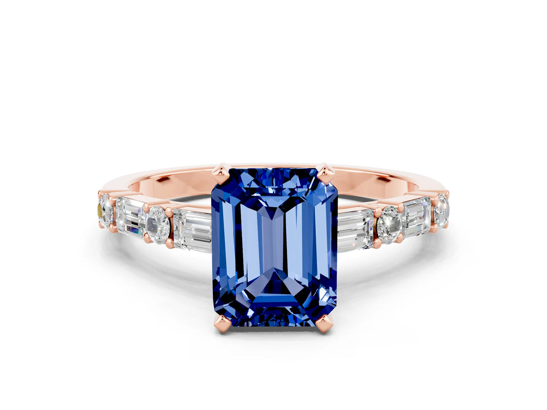 Rose gold Emerald Cut Blue Sapphire Solitaire with Side Baguettes and Channel Set Band
