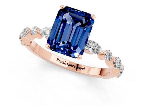 Rose gold Emerald Cut Blue Sapphire Solitaire with Side Stones on a Pavé Band and Four-Prong Setting_1