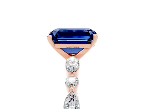 Rose gold Emerald Cut Blue Sapphire Solitaire with Side Stones on a Pavé Band and Four-Prong Setting_5