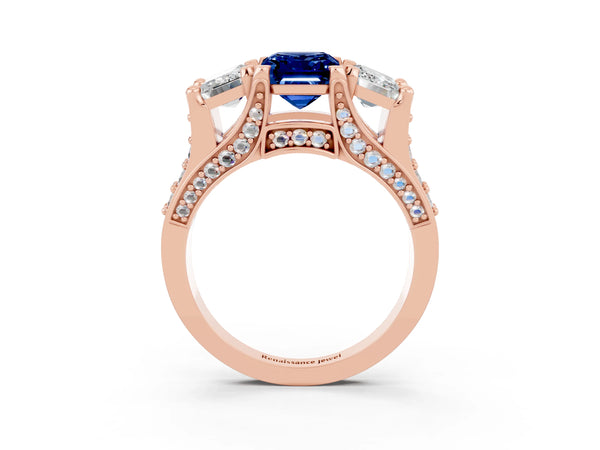 Rose gold Emerald Cut Blue Sapphire Three-Stone Ring with Channel Set Band and Four-Prong Setting