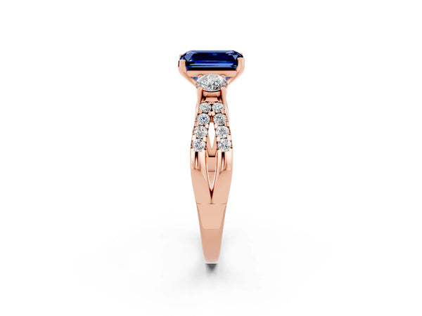 Rose gold Emerald Cut Blue Sapphire Three-Stone Ring with Pavé Split Shank and Four-Prong Setting