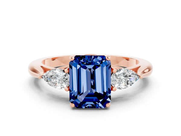 Rose gold Emerald Cut Blue Sapphire Three-Stone Ring with Pear  Side Stones and Prong Setting