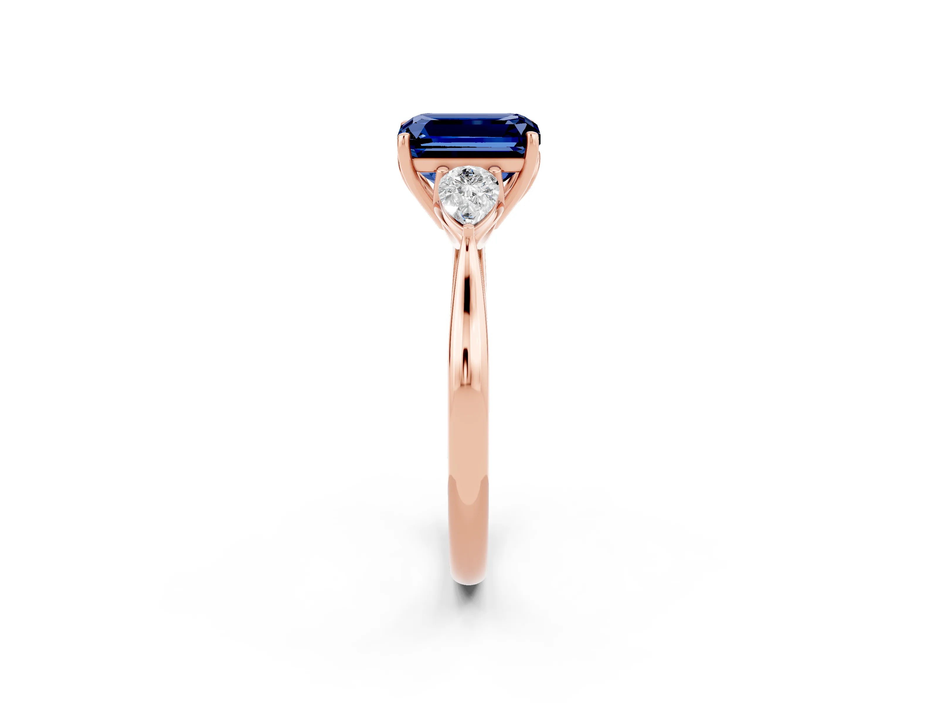 Rose gold Emerald Cut Blue Sapphire Three-Stone Ring with Pear Side Stones and Four-Prong Setting_14