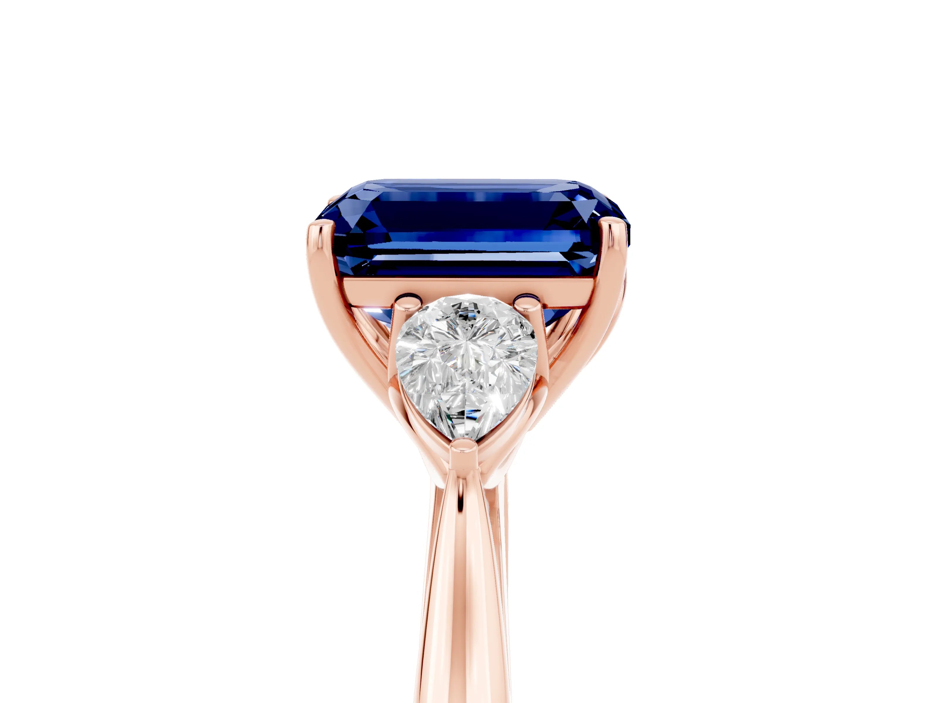 Rose gold Emerald Cut Blue Sapphire Three-Stone Ring with Pear Side Stones and Four-Prong Setting_17