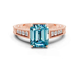 Rose gold Emerald Cut Blue Topaz Engagement Ring with Milgrain Channel Set Band and Prong Setting