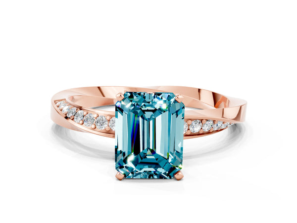 Rose gold Emerald Cut Blue Topaz Engagement Ring with Side Stone Accents and Four-Prong Setting