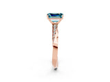Rose gold Emerald Cut Blue Topaz Engagement Ring with Side Stone Accents and Four-Prong Setting_29