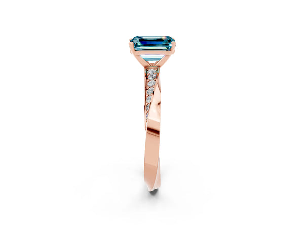 Rose gold Emerald Cut Blue Topaz Engagement Ring with Side Stone Accents and Four-Prong Setting