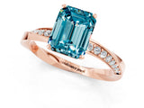 Rose gold Emerald Cut Blue Topaz Engagement Ring with Side Stone Accents and Four-Prong Setting_61
