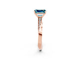 Rose gold Emerald Cut Blue Topaz Engagement Ring with Side Stone Accents and Four-Prong Setting_62