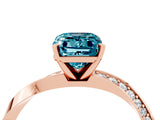 Rose gold Emerald Cut Blue Topaz Engagement Ring with Side Stone Accents and Four-Prong Setting_64