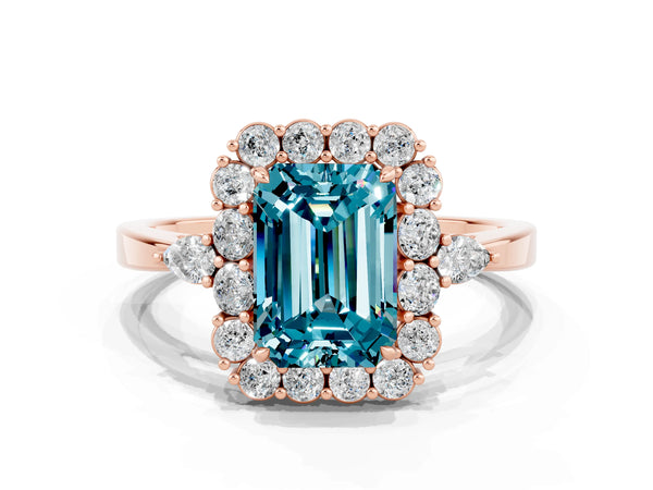 Rose gold Emerald Cut Blue Topaz Halo Ring with Pear Side Stones and Prong Setting