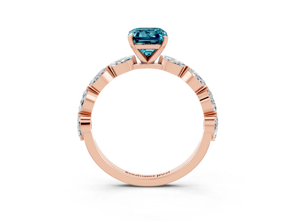 Rose gold Emerald Cut Blue Topaz Ring with Marquise Side Stones and Prong Setting
